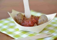 Mini currywurst (fried mini sausage with curry-tomato-sauce)