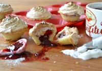 Little cakes with fruit filling and coconut meringue topping