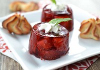 Strawberries in red wine jelly with almond paste cookies