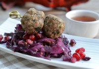 Spiced red cabbage and pomegranate salad with meatballs and spicy dip